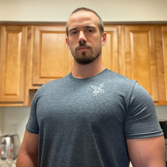 Founder Chris Worman in the Dark Heather Barbell Eagle Left Chest Unisex Workout Shirt WL