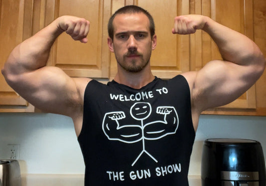 Founder Chris Worman in the Welcome to the Gun Show Unisex Muscle Shirt